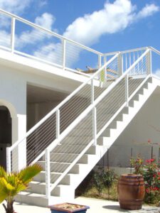 white staircase with railings