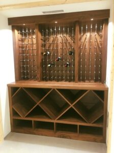 a wooden and metal wine rack