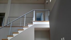 modern cable railing on stairs