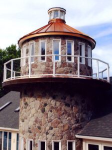 a cylindrical structure with cable railings