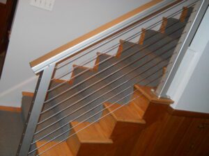 silver cable railings on a staircase