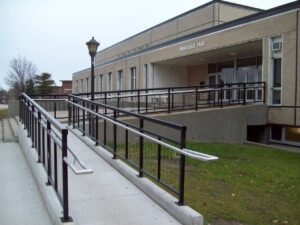 a ramp with black railings